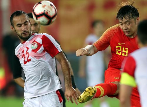 中国踢足球vs塔吉克斯坦的相关图片